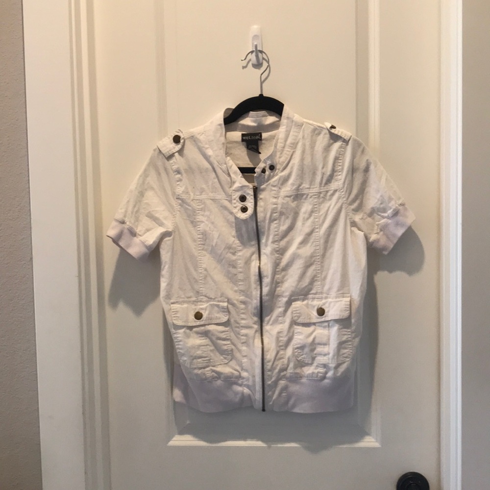 White seal zip up shirt.